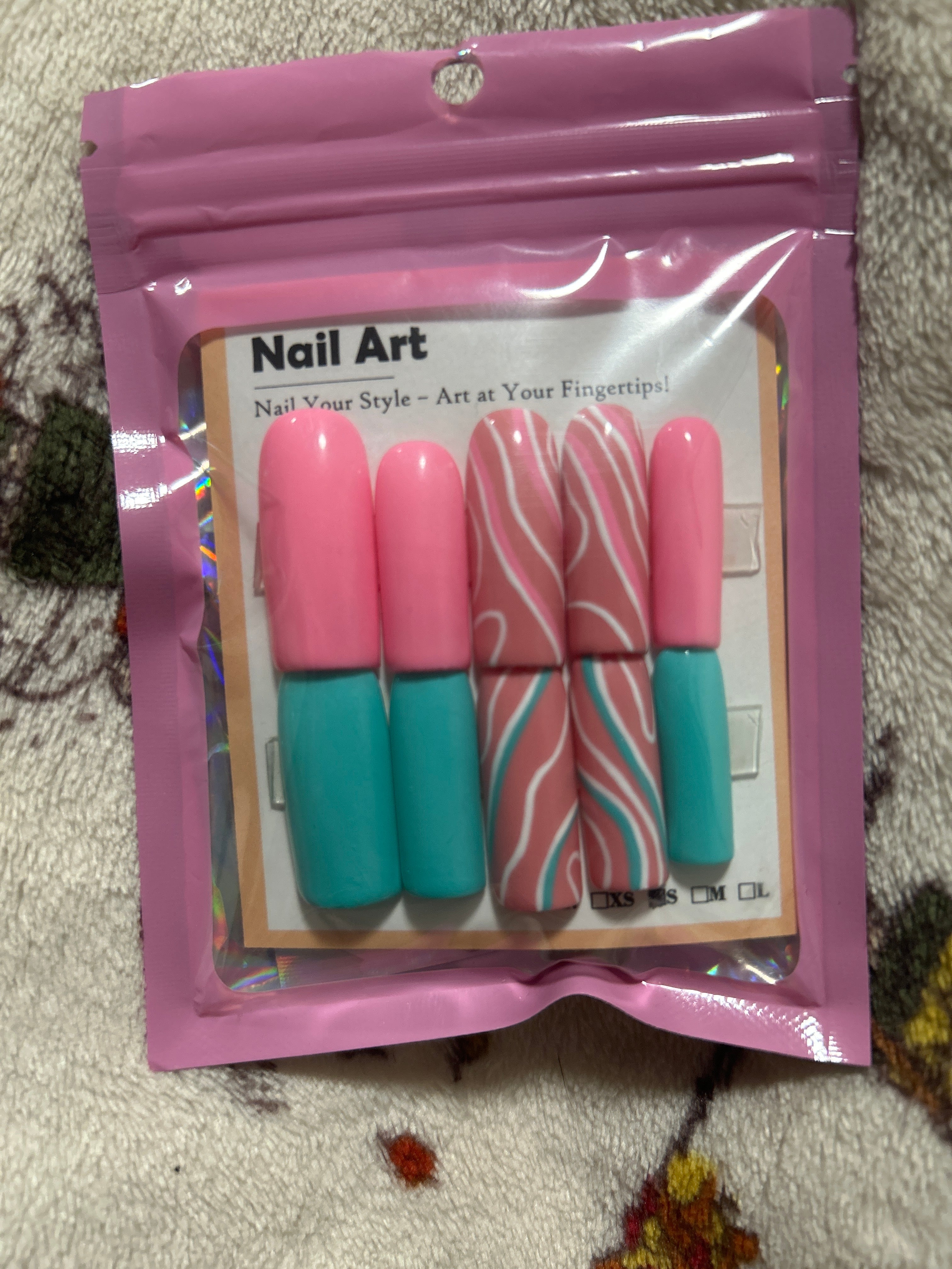 Pink and blue press on