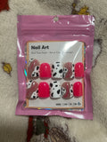 Hot pink, cow print press ons