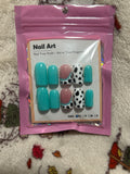 Teal cow print press ons